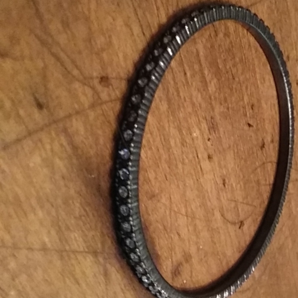 Black and silver tone bracelet with fake diamonds